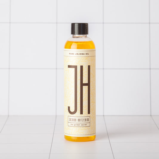 שמן חוחובה טהור 250 מ"ל בבקבוק זכוכית כהה — Gold Jojoba, כבישה קרה תוצרת ישראל
