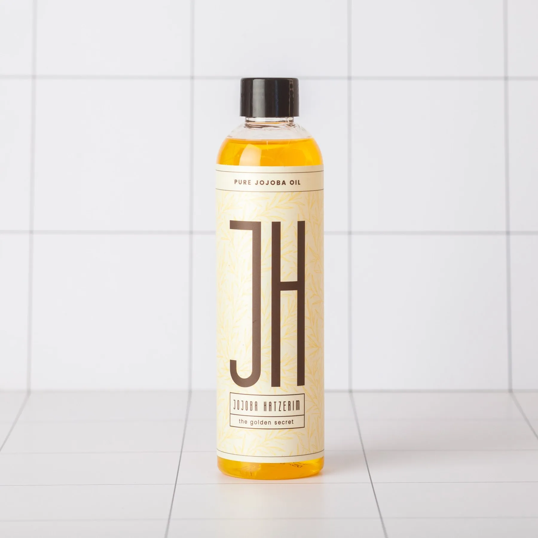 שמן חוחובה טהור 250 מ"ל בבקבוק זכוכית כהה — Gold Jojoba, כבישה קרה תוצרת ישראל